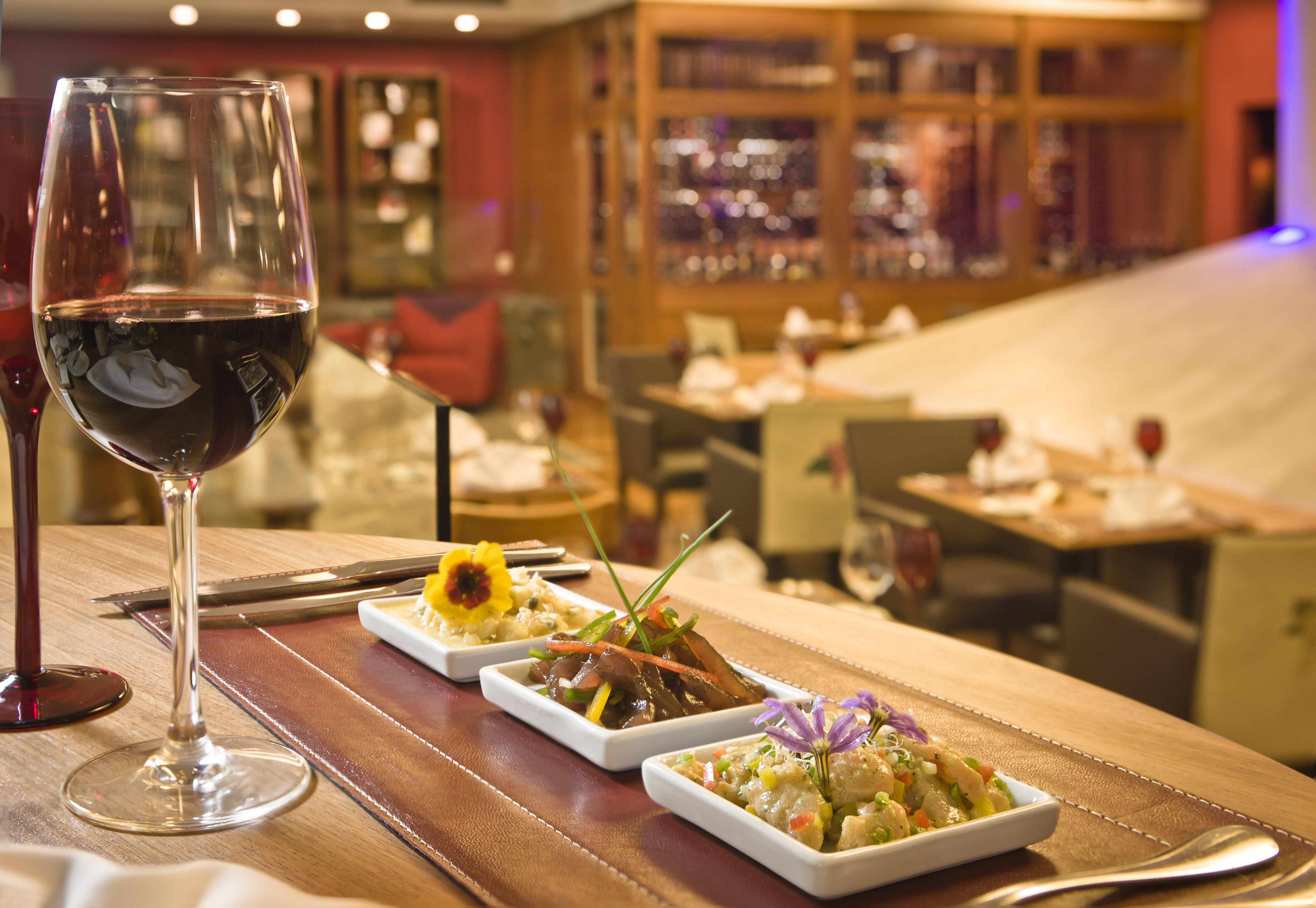 Bourbon Resort Атибая Экстерьер фото A wine glass and tapas