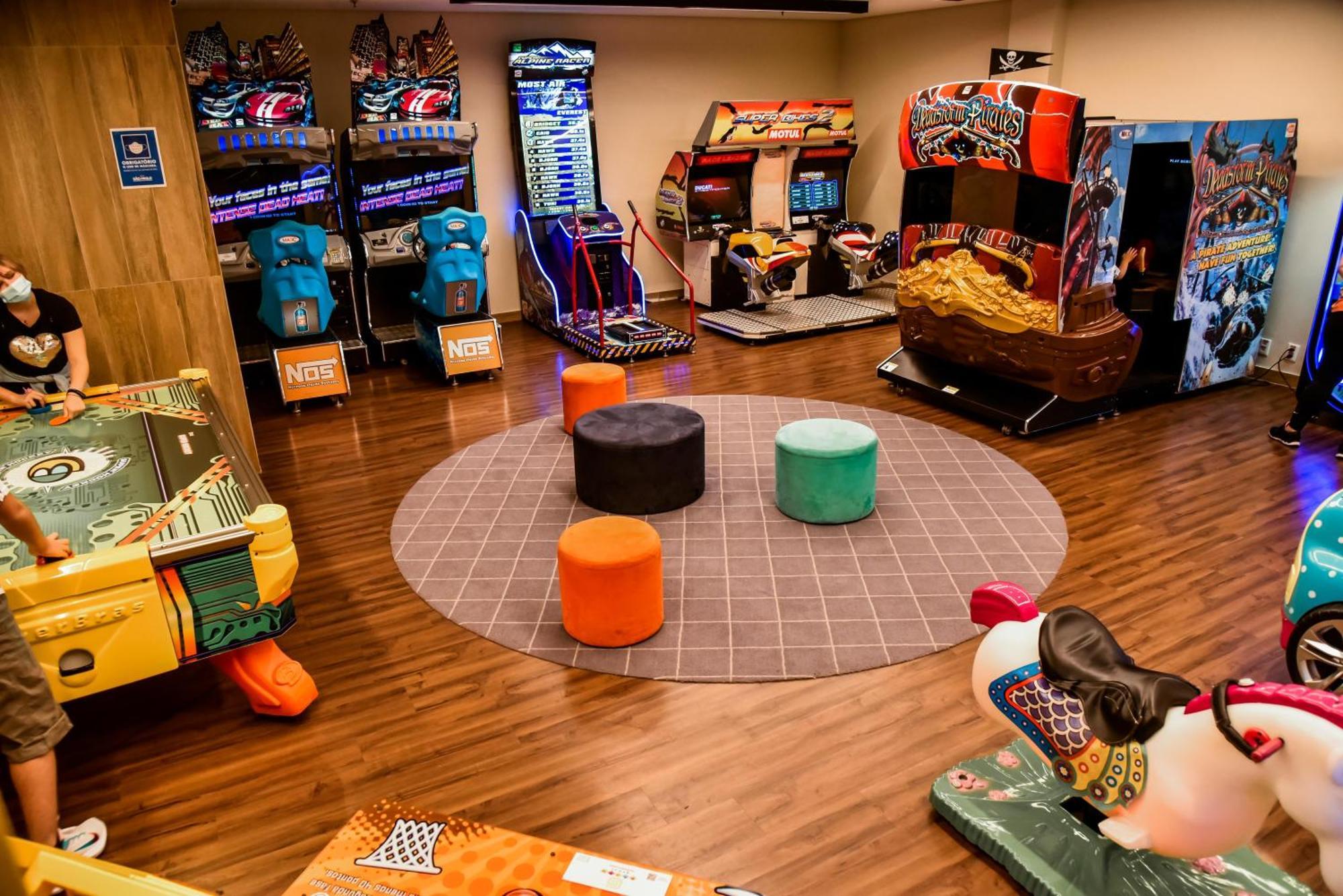 Bourbon Resort Атибая Экстерьер фото The arcade at the 2012 Olympic Village
